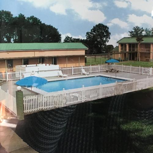 Úszómedence, Garden Inn & Suites in Pensacola (Florida) Úszómedence, Garden Inn & Suites in Pensacola (Florida)