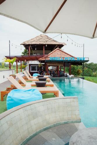 Swell Hotel, Pool Bar & Restaurant in Tanah Lot Swell Hotel, Pool Bar & Restaurant in Tanah Lot