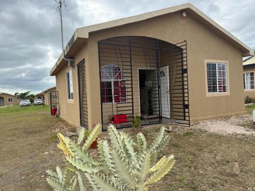 Finest Accommodation Phoenix Prk Village 1,Phase 4 lot 1347, 26 Sheawater Ave in Spanish Town Finest Accommodation Phoenix Prk Village 1,Phase 4 lot 1347, 26 Sheawater Ave in Spanish Town