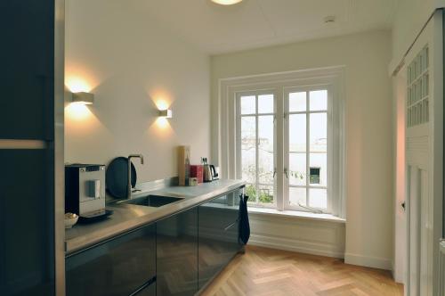 Kitchen, Boetiek Hotel Kampen in Kampen Kitchen, Boetiek Hotel Kampen in Kampen