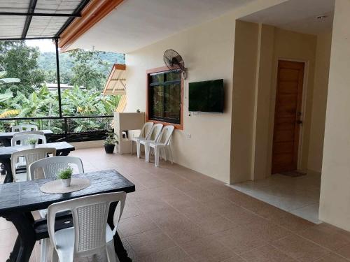 Shared lounge/TV area, Andresas Homestay in Loboc Shared lounge/TV area, Andresas Homestay in Loboc