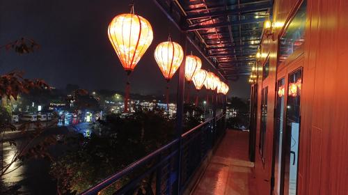 Balcony/terrace, Riverside Hoi An, Dolphins Hostel in Minh An Balcony/terrace, Riverside Hoi An, Dolphins Hostel in Minh An
