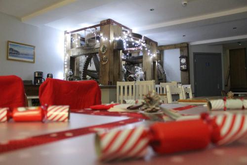 صالة مشتركة/ منطقة التلفزيون, The Old Mill, Bed & Breakfast in Biggar صالة مشتركة/ منطقة التلفزيون, The Old Mill, Bed & Breakfast in Biggar