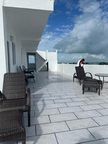 Buitenkant, SKY INN in Caye Caulker Buitenkant, SKY INN in Caye Caulker