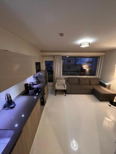 Kitchen, Modern Studio with Balcony in City Center in Ullanlinna Kitchen, Modern Studio with Balcony in City Center in Ullanlinna