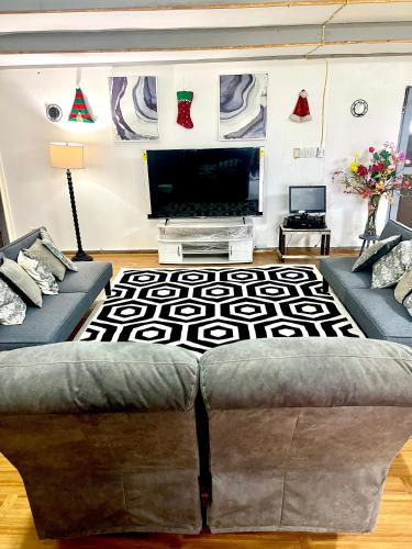 Shared lounge/TV area, Melissa cosy corner in Tafuna Shared lounge/TV area, Melissa cosy corner in Tafuna