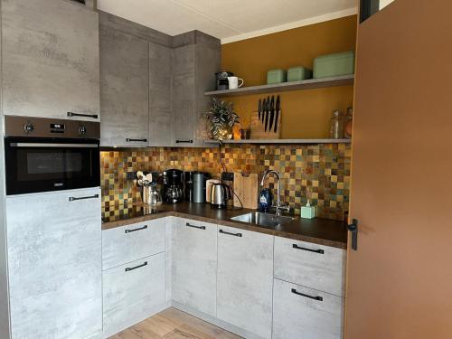 Kitchen, Spacious apartment in Maartenszee dune in Schagen Kitchen, Spacious apartment in Maartenszee dune in Schagen