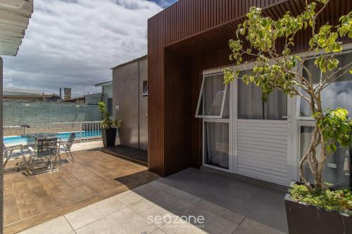 陽台/露台, Studio moderno em Sta. Mônica ASK002 (Studio moderno em Sta. Monica ASK002) in 伊塔科魯比 陽台/露台, Studio moderno em Sta. Mônica ASK002 (Studio moderno em Sta. Monica ASK002) in 伊塔科魯比