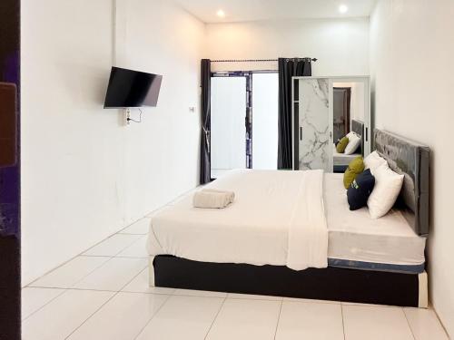 Urbanview Trunojoyo Homestay Banyuwangi by RedDoorz in Banyuwangi Town Urbanview Trunojoyo Homestay Banyuwangi by RedDoorz in Banyuwangi Town