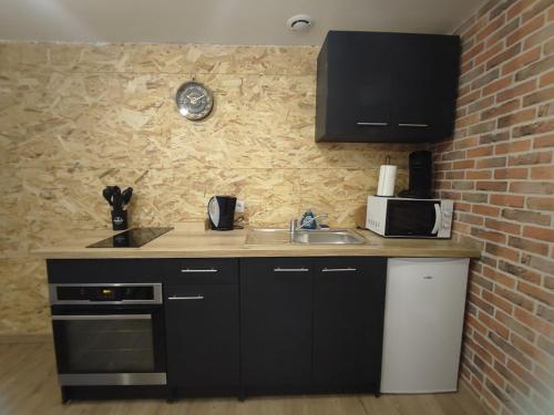 Kitchen, Le Stud'Eure in La Foret Du Parc Kitchen, Le Stud'Eure in La Foret Du Parc