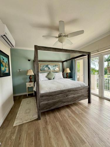 2Bed Modern Condo with AC, Pool, Rooftop patio, 5 Min to Beach in 오이스틴스 2Bed Modern Condo with AC, Pool, Rooftop patio, 5 Min to Beach in 오이스틴스