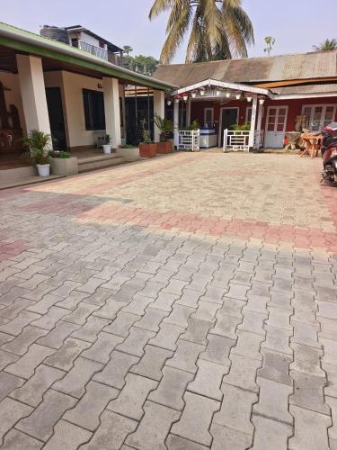 Bejárat, 18 négyzetméteres, 1 hálószobás 1 fürdőszobával Atilagaon területén (Aurora Annex) near Jorhat repülőtér Bejárat, 18 négyzetméteres, 1 hálószobás 1 fürdőszobával Atilagaon területén (Aurora Annex) near Jorhat repülőtér