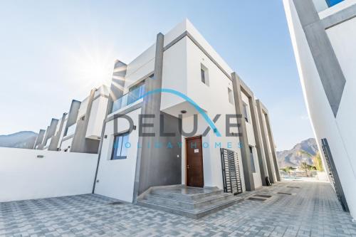 Exterior view, Modern 3BR with Mountain Views & Private Pool in Al Dana , Sharm, Fujairah by Deluxe Holiday Homes in Al Aqah Exterior view, Modern 3BR with Mountain Views & Private Pool in Al Dana , Sharm, Fujairah by Deluxe Holiday Homes in Al Aqah