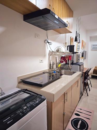Kitchen, Acellyne's Suites at Green 2 Residences with Netflix! in Dasmarinas Kitchen, Acellyne's Suites at Green 2 Residences with Netflix! in Dasmarinas