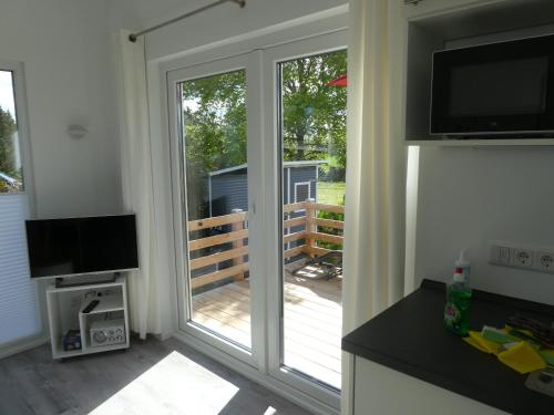 Shared lounge/TV area, Mobilheim Schleistern und Schleisonne in Olpenitz Shared lounge/TV area, Mobilheim Schleistern und Schleisonne in Olpenitz