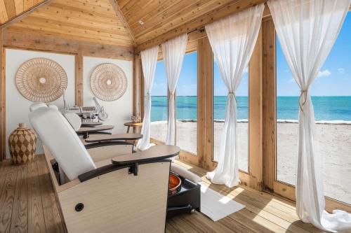 Спа, Ambergris Cay Private Island All Inclusive - PLS Island Hopper Flight Included in Гранд-Терк Спа, Ambergris Cay Private Island All Inclusive - PLS Island Hopper Flight Included in Гранд-Терк