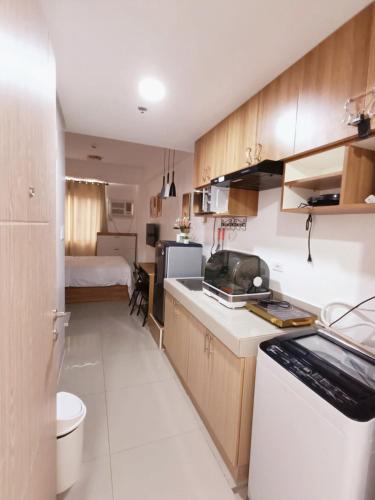 Kitchen, Acellyne's Suites at Green 2 Residences with Netflix! in Dasmarinas Kitchen, Acellyne's Suites at Green 2 Residences with Netflix! in Dasmarinas