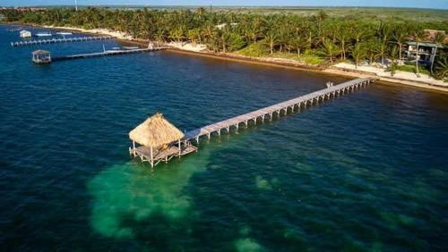 Beachfront Villa with Long Private Pier and Pool in Ambergris Caye Beachfront Villa with Long Private Pier and Pool in Ambergris Caye