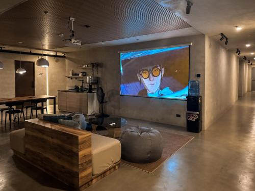 Shared lounge/TV area, Yamato Hostel near EDSA LRT Station Shared lounge/TV area, Yamato Hostel near EDSA LRT Station