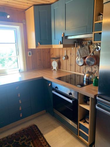 مطبخ, Cabin at Kvamskogen with a great view in Norheimsund مطبخ, Cabin at Kvamskogen with a great view in Norheimsund