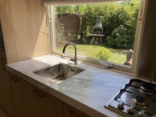 Konyha, Holiday home in Sint Maartenszee in Schagen Konyha, Holiday home in Sint Maartenszee in Schagen