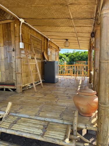 Balcony/terrace, Lakeside Bamboo Cabin in Chum Het Balcony/terrace, Lakeside Bamboo Cabin in Chum Het