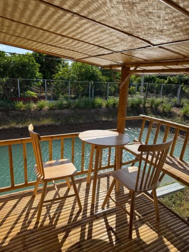 Balcony/terrace, Lakeside Bamboo Cabin in Chum Het Balcony/terrace, Lakeside Bamboo Cabin in Chum Het
