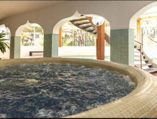 Hot tub, La Baume La Palmeraie Camping Resort in Capitou Hot tub, La Baume La Palmeraie Camping Resort in Capitou