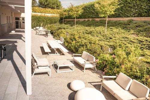 شرفة/ تراس, Renaissance Paris Hippodrome de St. Cloud Hotel in Rueil-Malmaison شرفة/ تراس, Renaissance Paris Hippodrome de St. Cloud Hotel in Rueil-Malmaison