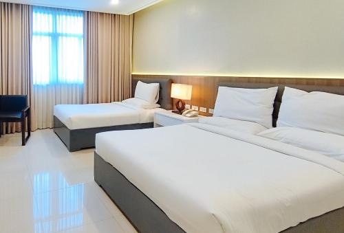 Iloilo Gateway Hotel and Suites by RedDoorz in Pavia Iloilo Gateway Hotel and Suites by RedDoorz in Pavia