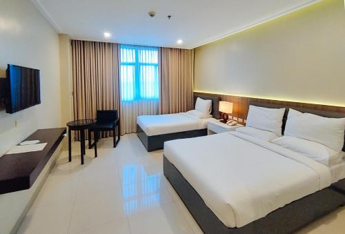Iloilo Gateway Hotel and Suites by RedDoorz in Pavia Iloilo Gateway Hotel and Suites by RedDoorz in Pavia