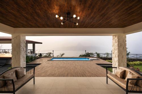 Surrounding environment, SaffronStays Blue Infinitum in Thakursai Surrounding environment, SaffronStays Blue Infinitum in Thakursai