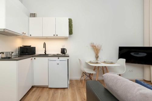 Cozinha, Nowoczesne Studia Blisko Centrum Gdańska by Rent like home (Nowoczesne Studia Blisko Centrum Gdanska by Rent like home) in Nether city Cozinha, Nowoczesne Studia Blisko Centrum Gdańska by Rent like home (Nowoczesne Studia Blisko Centrum Gdanska by Rent like home) in Nether city