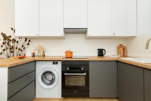 Cozinha, Nowoczesne Studia Blisko Centrum Gdańska by Rent like home (Nowoczesne Studia Blisko Centrum Gdanska by Rent like home) in Nether city Cozinha, Nowoczesne Studia Blisko Centrum Gdańska by Rent like home (Nowoczesne Studia Blisko Centrum Gdanska by Rent like home) in Nether city