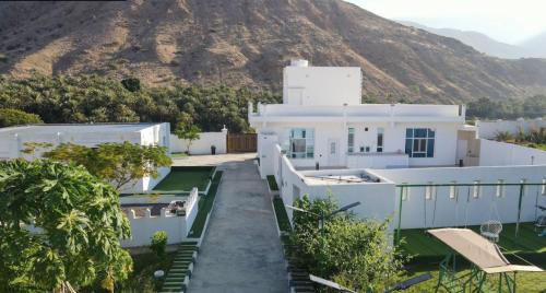 Palm Oasis Rest House in Tiwi Palm Oasis Rest House in Tiwi