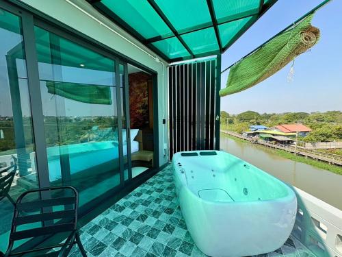 Balcony/terrace, Chainam-Charmchuree residences cafe and spa in Bang Bua Thong Balcony/terrace, Chainam-Charmchuree residences cafe and spa in Bang Bua Thong