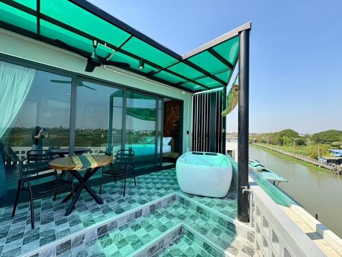 Balcony/terrace, Chainam-Charmchuree residences cafe and spa in Bang Bua Thong Balcony/terrace, Chainam-Charmchuree residences cafe and spa in Bang Bua Thong