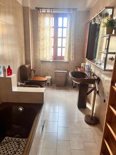 Casa di Zoe apartment - Punto di sosta x bikes auto e moto a 20 minuti dall'autostrada - parcheggio in 希維塔卡斯特拉納 Casa di Zoe apartment - Punto di sosta x bikes auto e moto a 20 minuti dall'autostrada - parcheggio in 希維塔卡斯特拉納