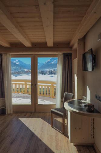 This photo about Ecohotel B&B Chalet des Alpes Livigno shared on HyHotel.com