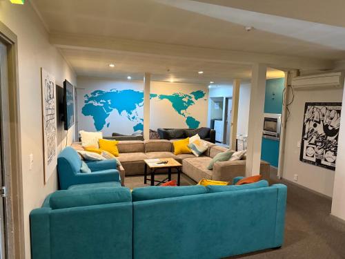 صالة مشتركة/ منطقة التلفزيون, UpTown Backpackers in وسط المدينة صالة مشتركة/ منطقة التلفزيون, UpTown Backpackers in وسط المدينة