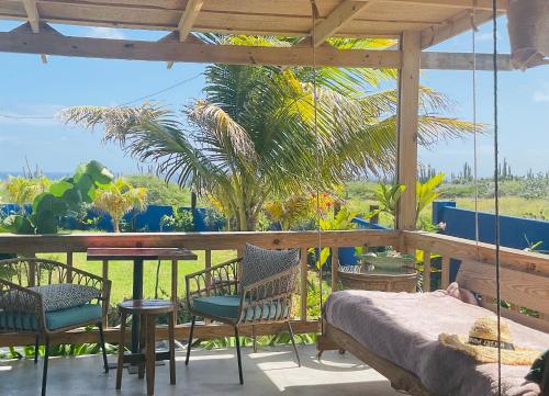 Balkon/terasa, The WildSide Aruba Caribbean Cabanas in Savaneta Balkon/terasa, The WildSide Aruba Caribbean Cabanas in Savaneta