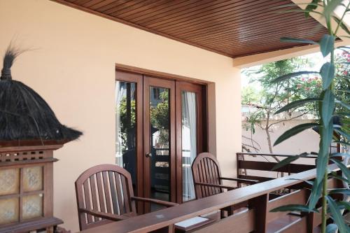 ระเบียง/ชานเรือน, Arbiru Beach Resort in ดิลี ระเบียง/ชานเรือน, Arbiru Beach Resort in ดิลี