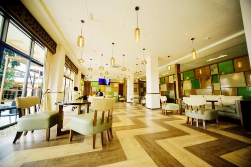 Shared lounge/TV area, Hotel Africana Ltd in Kampala Shared lounge/TV area, Hotel Africana Ltd in Kampala