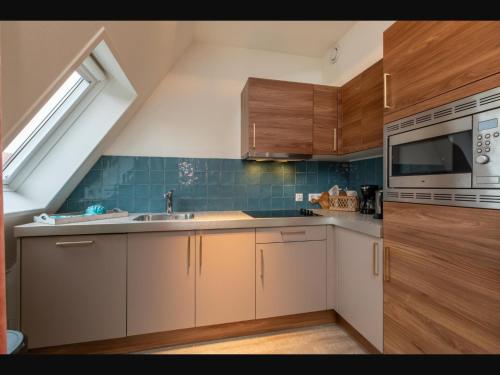 Cocina, Holiday home in Zoutelande with balcony in Zoutelande Cocina, Holiday home in Zoutelande with balcony in Zoutelande