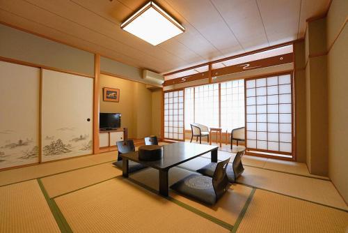 kawasan lounge/TV kongsi, Yumoto Kanko Hotel Saikyo in Nagato kawasan lounge/TV kongsi, Yumoto Kanko Hotel Saikyo in Nagato