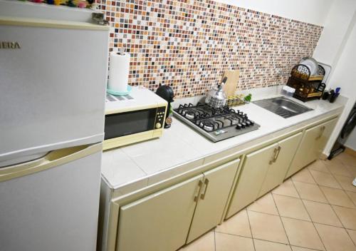 주방, Hogar Feliz - apartment in 드체이라 엘 지하디아 주방, Hogar Feliz - apartment in 드체이라 엘 지하디아