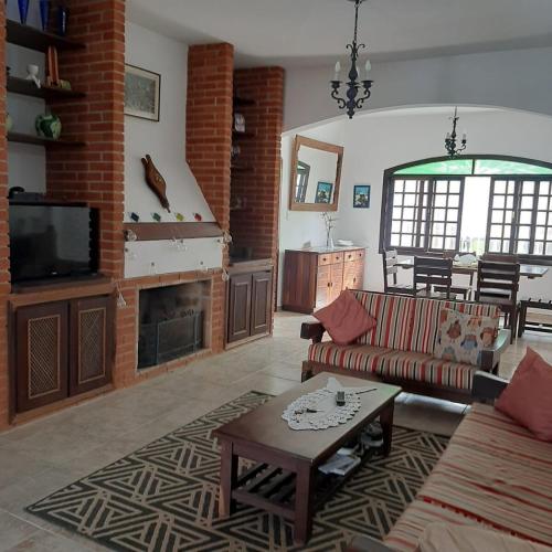 Casa de férias com piscina e churrasqueira! (Casa de ferias com piscina e churrasqueira!) in 파르케 발네아리우 오아시스 Casa de férias com piscina e churrasqueira! (Casa de ferias com piscina e churrasqueira!) in 파르케 발네아리우 오아시스
