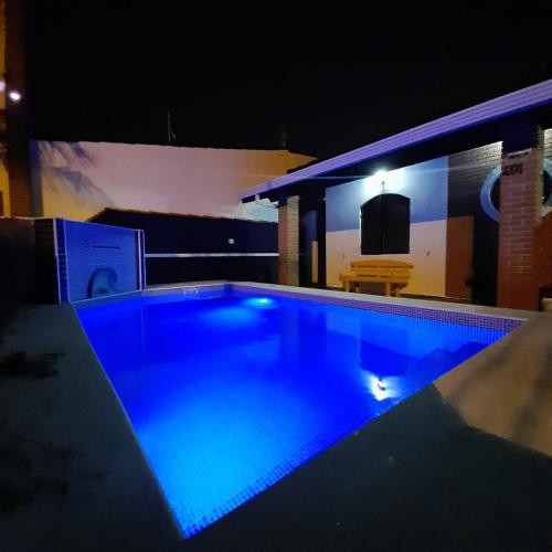 Casa de férias com piscina e churrasqueira! (Casa de ferias com piscina e churrasqueira!) in 파르케 발네아리우 오아시스 Casa de férias com piscina e churrasqueira! (Casa de ferias com piscina e churrasqueira!) in 파르케 발네아리우 오아시스