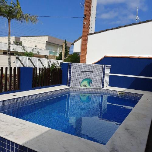 Casa de férias com piscina e churrasqueira! (Casa de ferias com piscina e churrasqueira!) in 파르케 발네아리우 오아시스 Casa de férias com piscina e churrasqueira! (Casa de ferias com piscina e churrasqueira!) in 파르케 발네아리우 오아시스