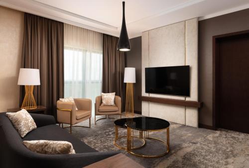 ห้องส่วนกลางสำหรับนั่งเล่น/ดูทีวี, DoubleTree by Hilton Lodz in ลอดซ์ ห้องส่วนกลางสำหรับนั่งเล่น/ดูทีวี, DoubleTree by Hilton Lodz in ลอดซ์